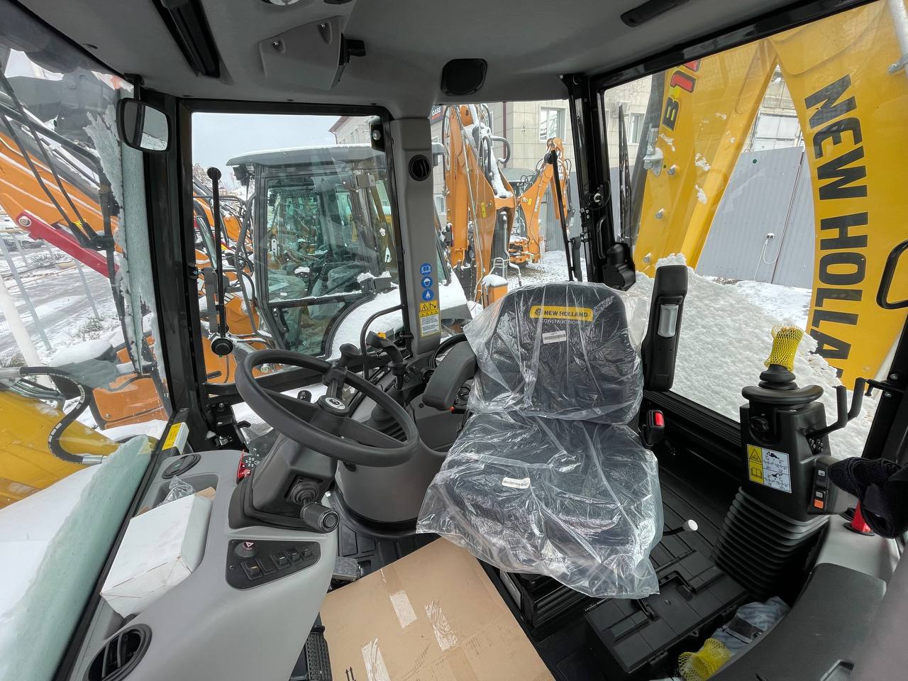 Экскаватор-погрузчик NEW HOLLAND B115B