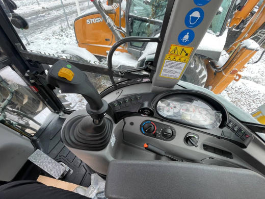 Экскаватор-погрузчик NEW HOLLAND B115B